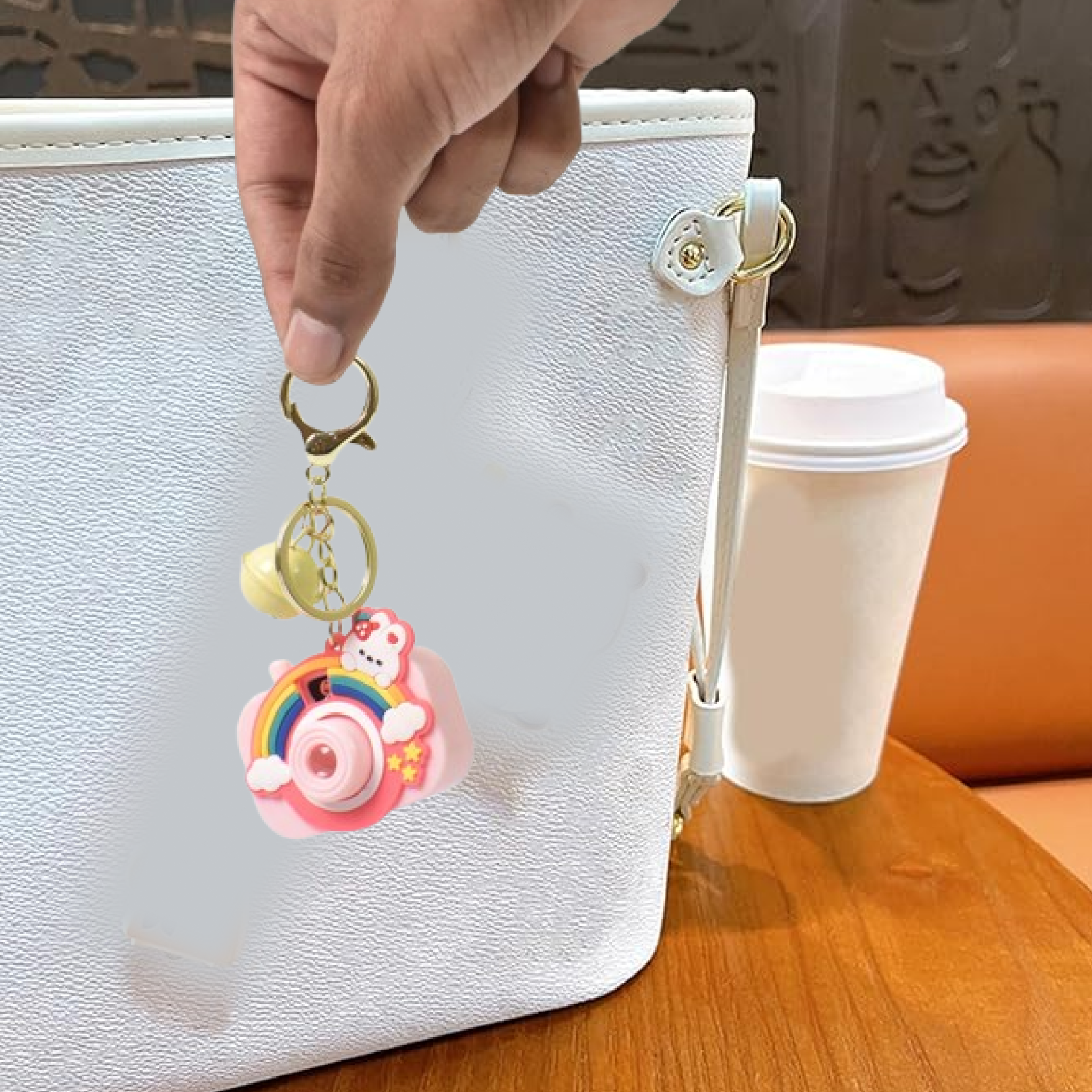 Projective Camera Keychain displayed on a key holder