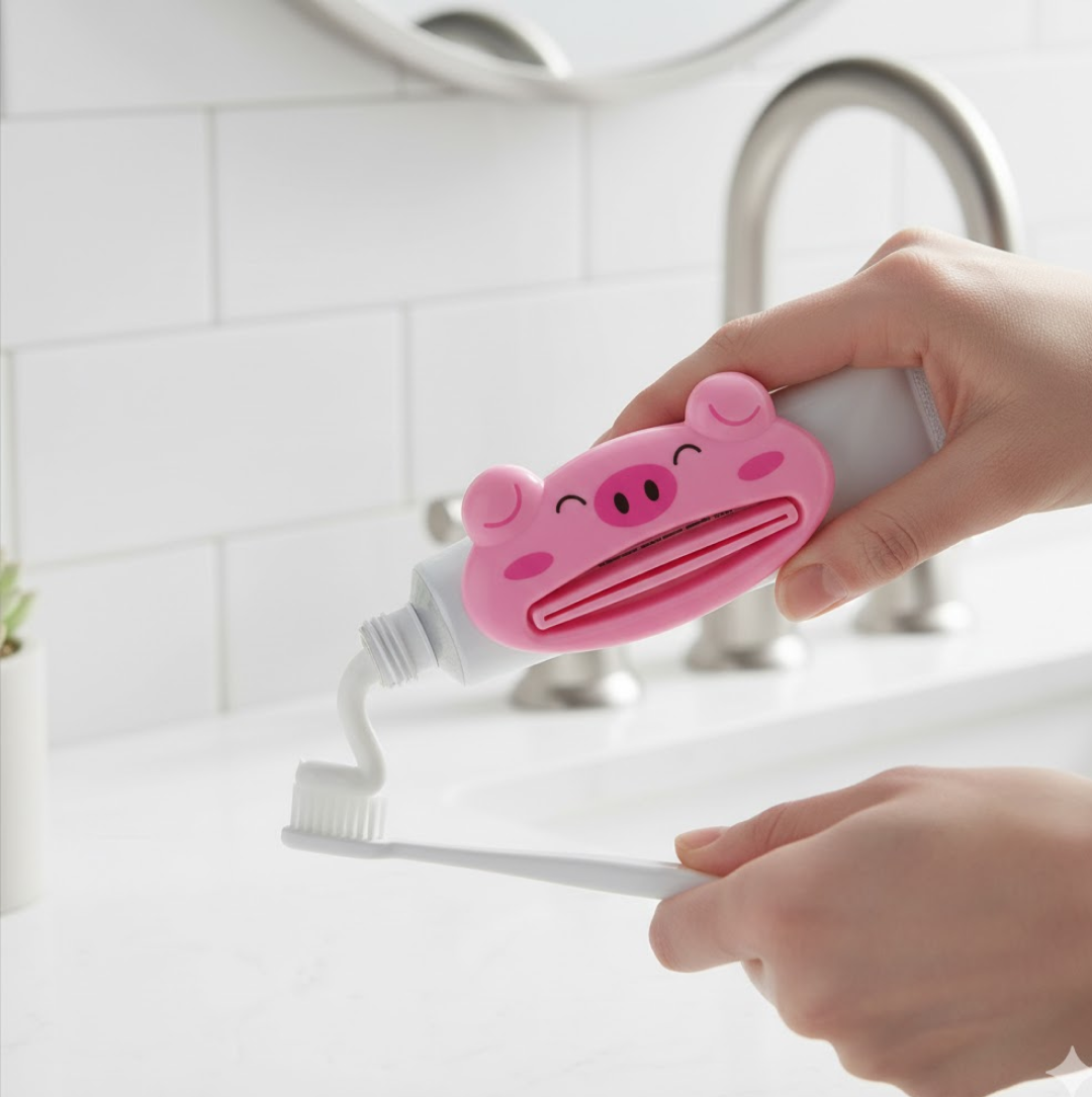 Additional view of toothpaste tube squeezer functionality