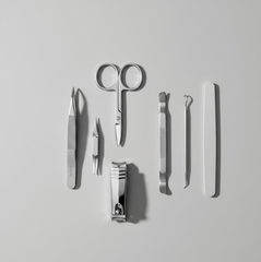 Detailed view of nail clippers in manicure set