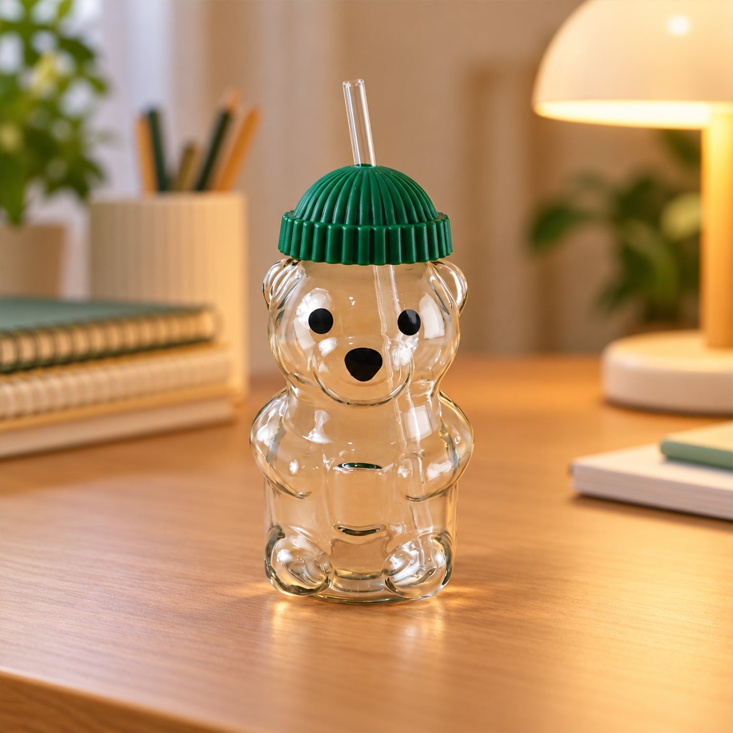 Bear glass sipper with straw on white background