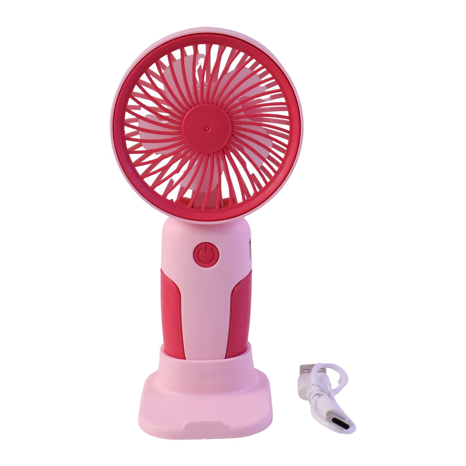 Person using mini handheld fan outdoors