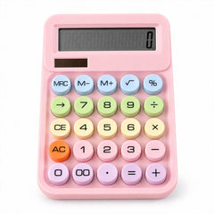 A pink desktop calculator with a black display and pastel-colored round keys is centered on a plain white background.