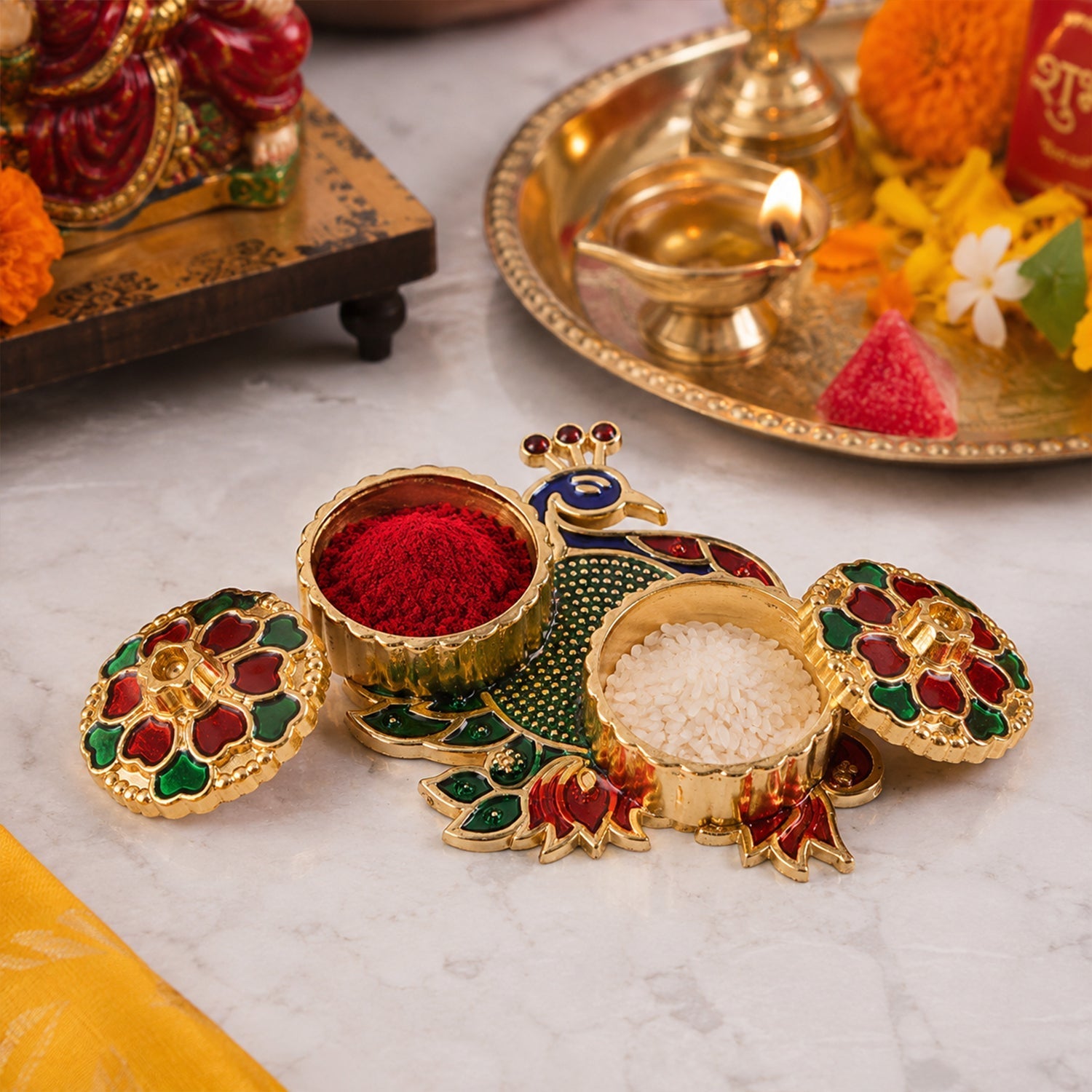 Close-up of peacock kumkum holder design