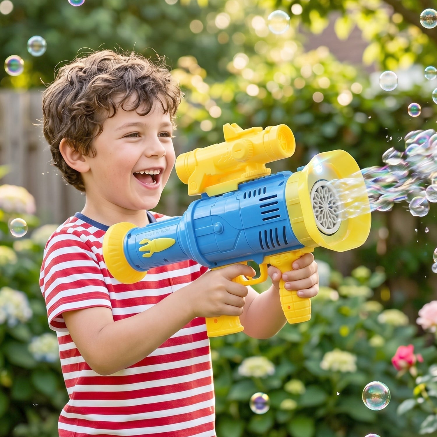 Bubble maker machine in use by child