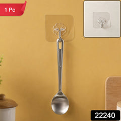 A silver spoon hanging from a transparent self-adhesive hook on a yellow wall, with a close-up inset and '1 Pc' and '22240'