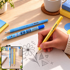 A hand draws a flower on white paper with a yellow mechanical pencil, two blue pencils rest nearby.