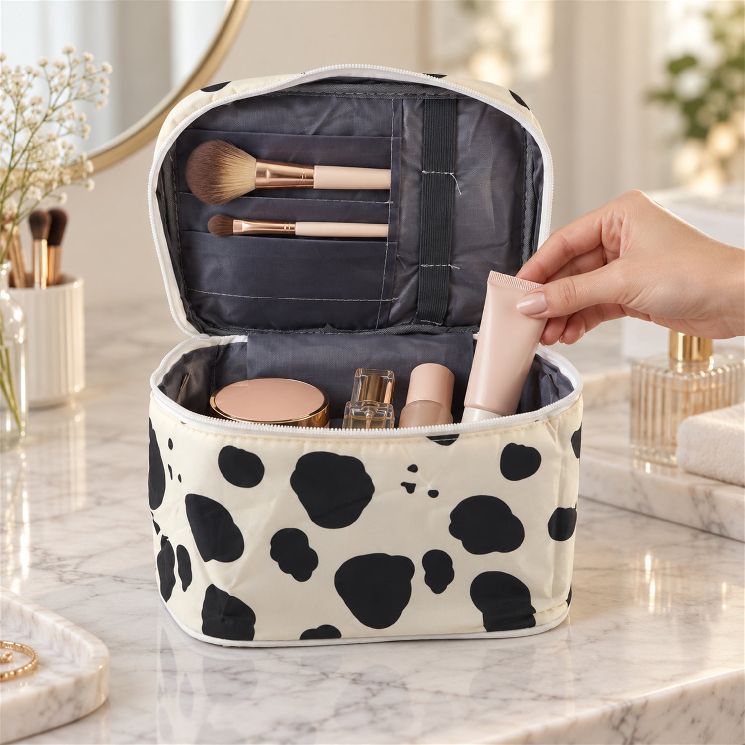 Spotted travel makeup pouch opened for cosmetics