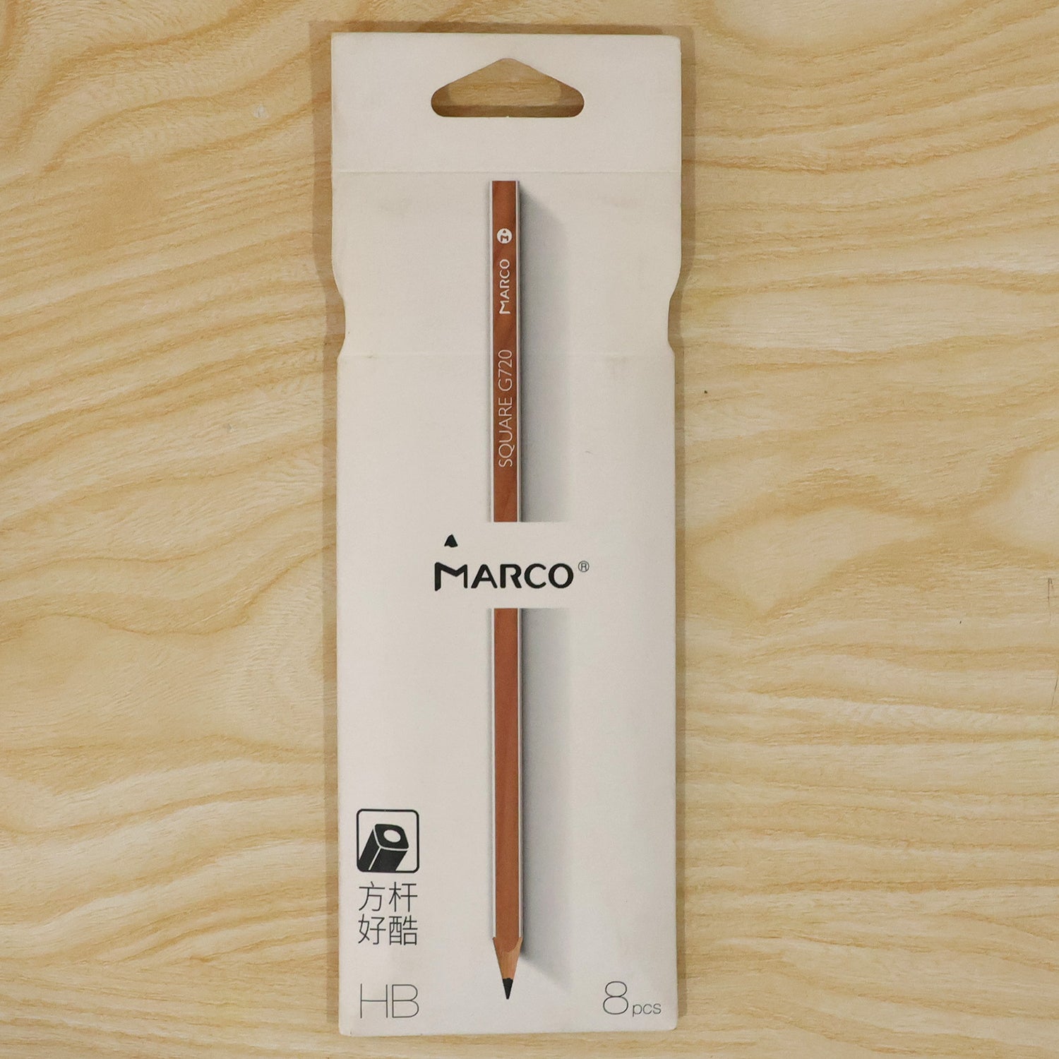 A single light brown pencil is displayed in white retail packaging with