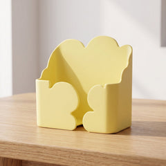 Close-up of the self-adhesive charging stand, showing its sturdy design.