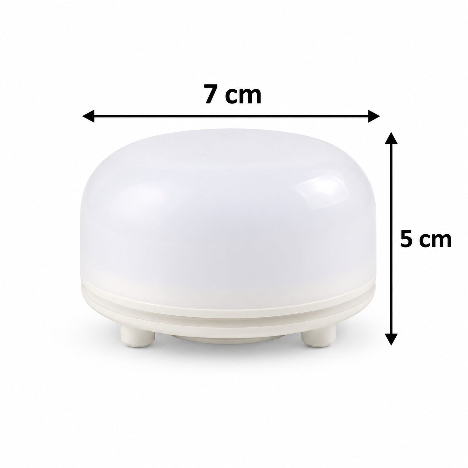 A white dome-shaped night light with small feet, displaying its dimensions of 7 cm width and 5 cm height.