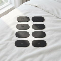 Black mouth tape patches arranged on bed