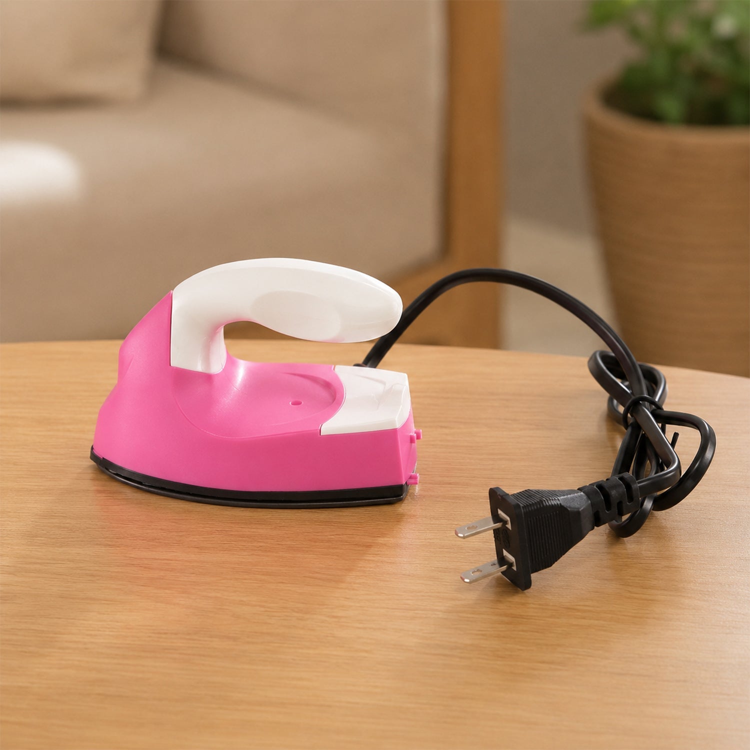 Compact iron used for quick touch ups