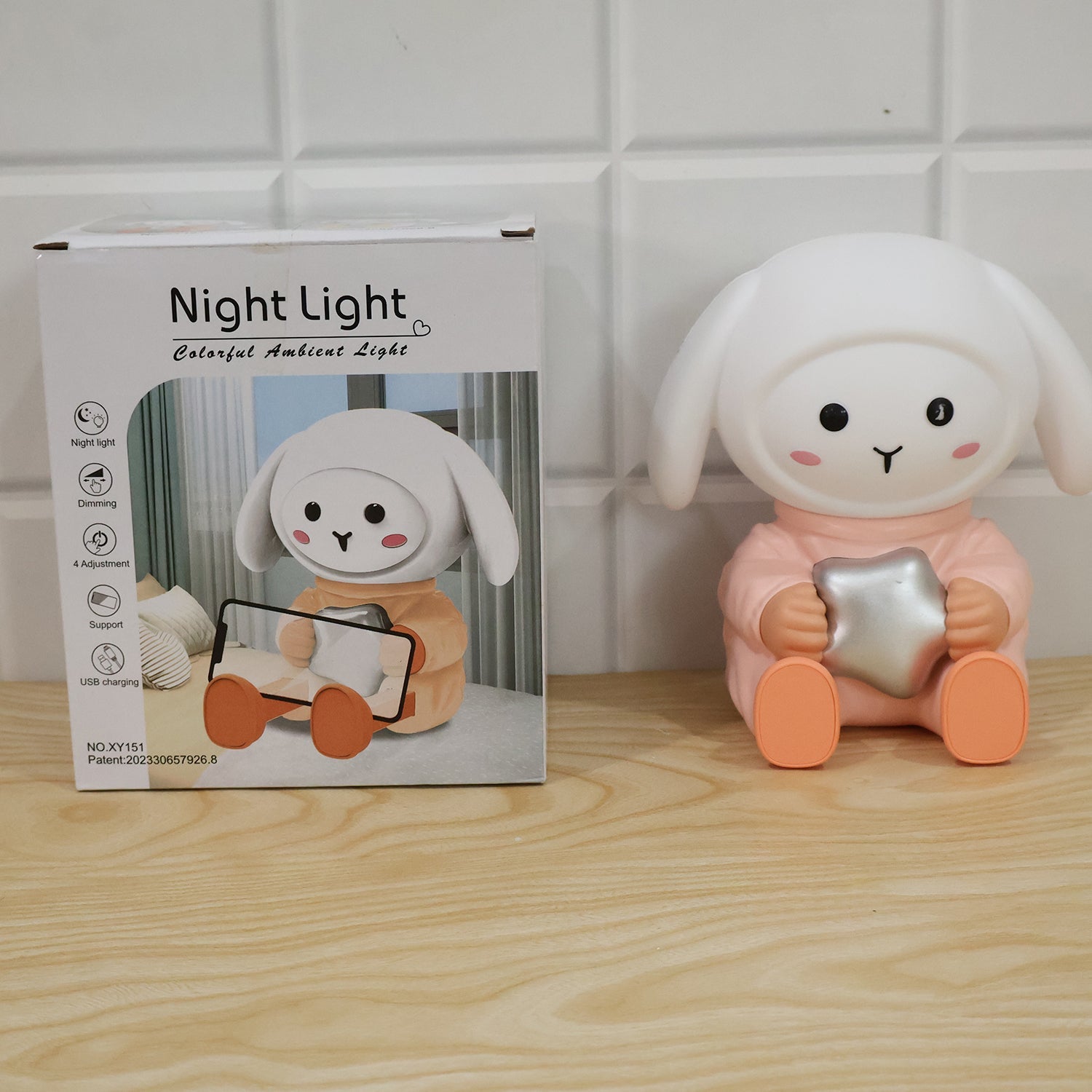 Live photo of rabbit LED night light with phone stand