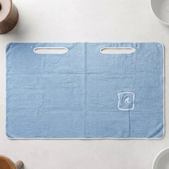 Absorbent towel with hand openings