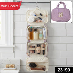 Open travel organizer bag with toiletries