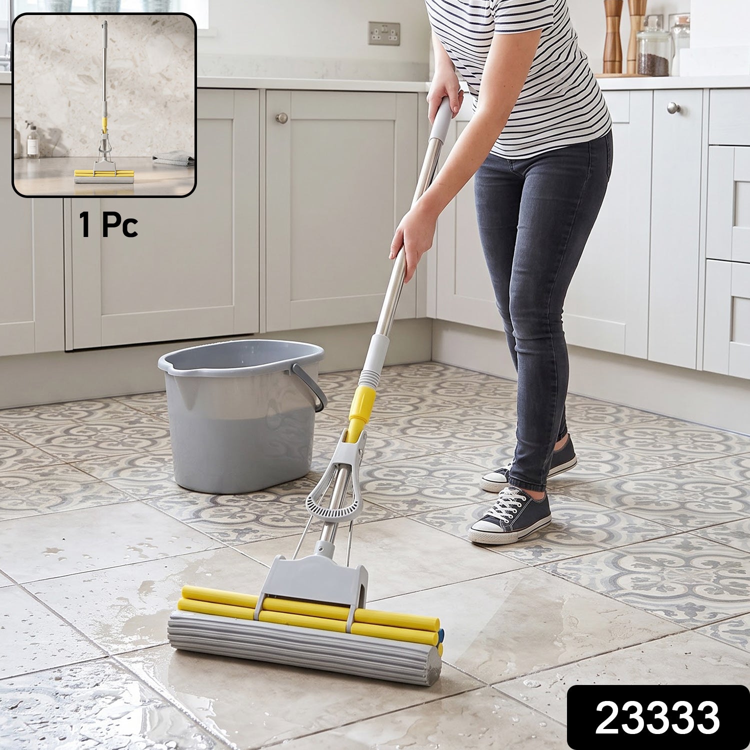A person cleans a wet tiled kitchen floor with a yellow and grey sponge mop, a grey bucket is visible.
