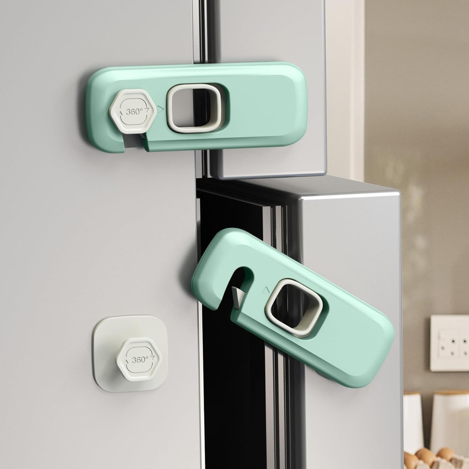 Adhesive child safety lock installed on refrigerator doors