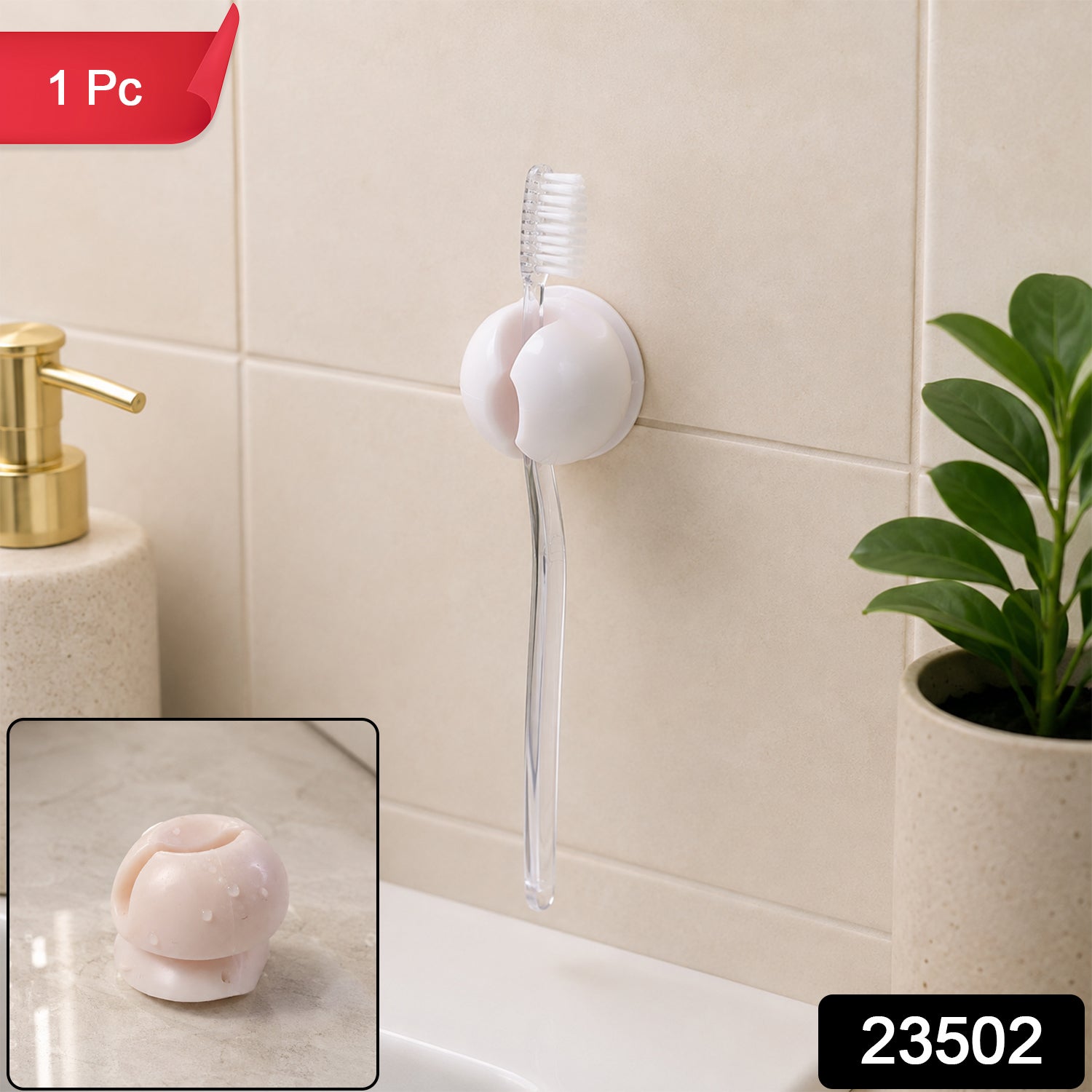 A white toothbrush holder clip on a tiled wall, holding a clear toothbrush above a sink, with a soap dispenser and â€“ view 2