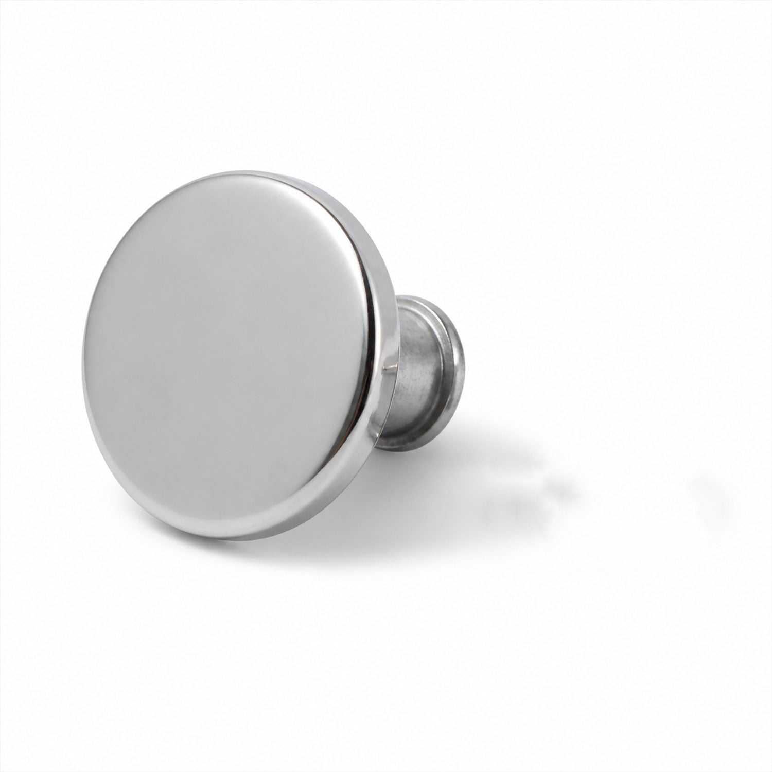 A single shiny silver metal button pin with a short post, casting a shadow on a white background.