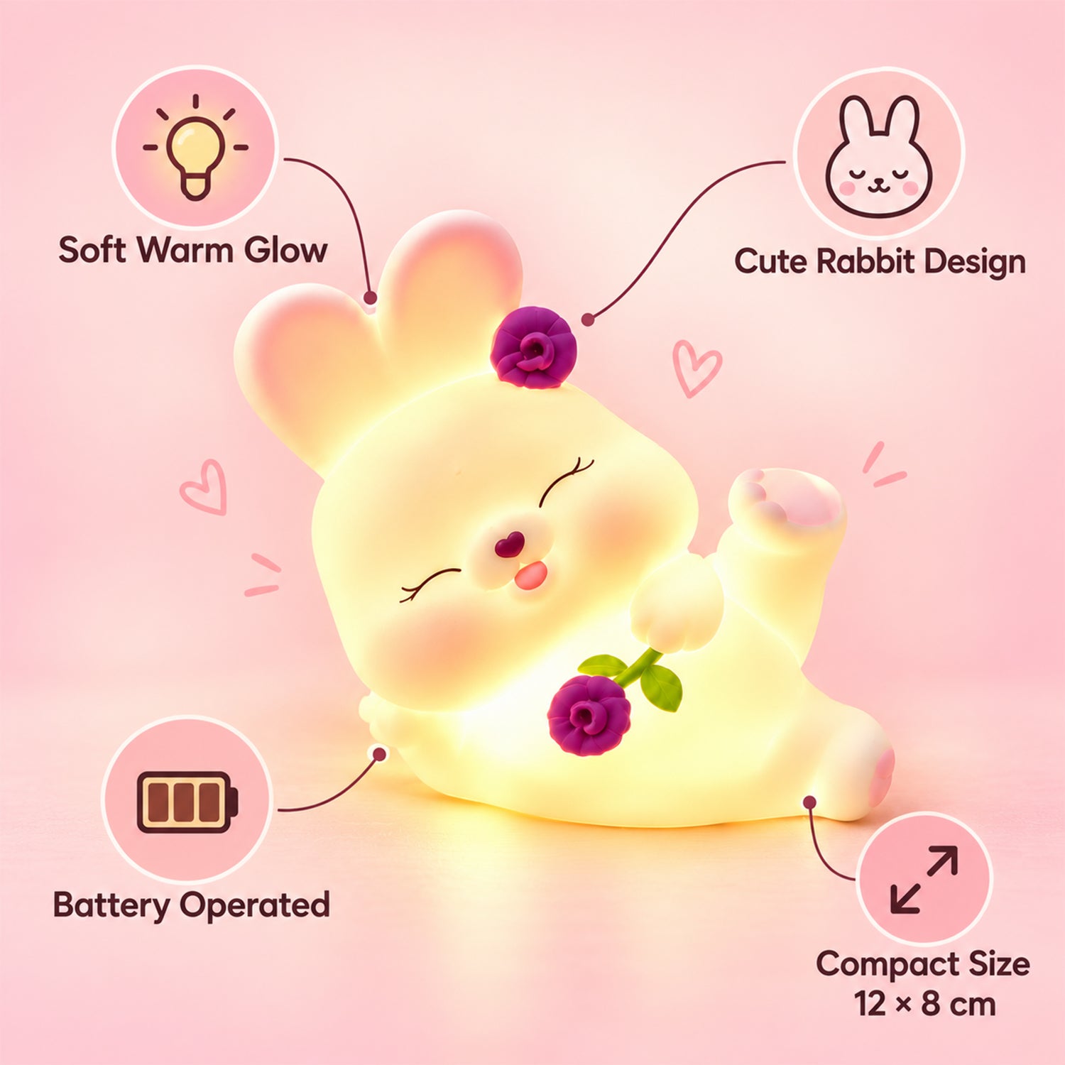 Detailed view of the reclining rabbit night light with floral accents