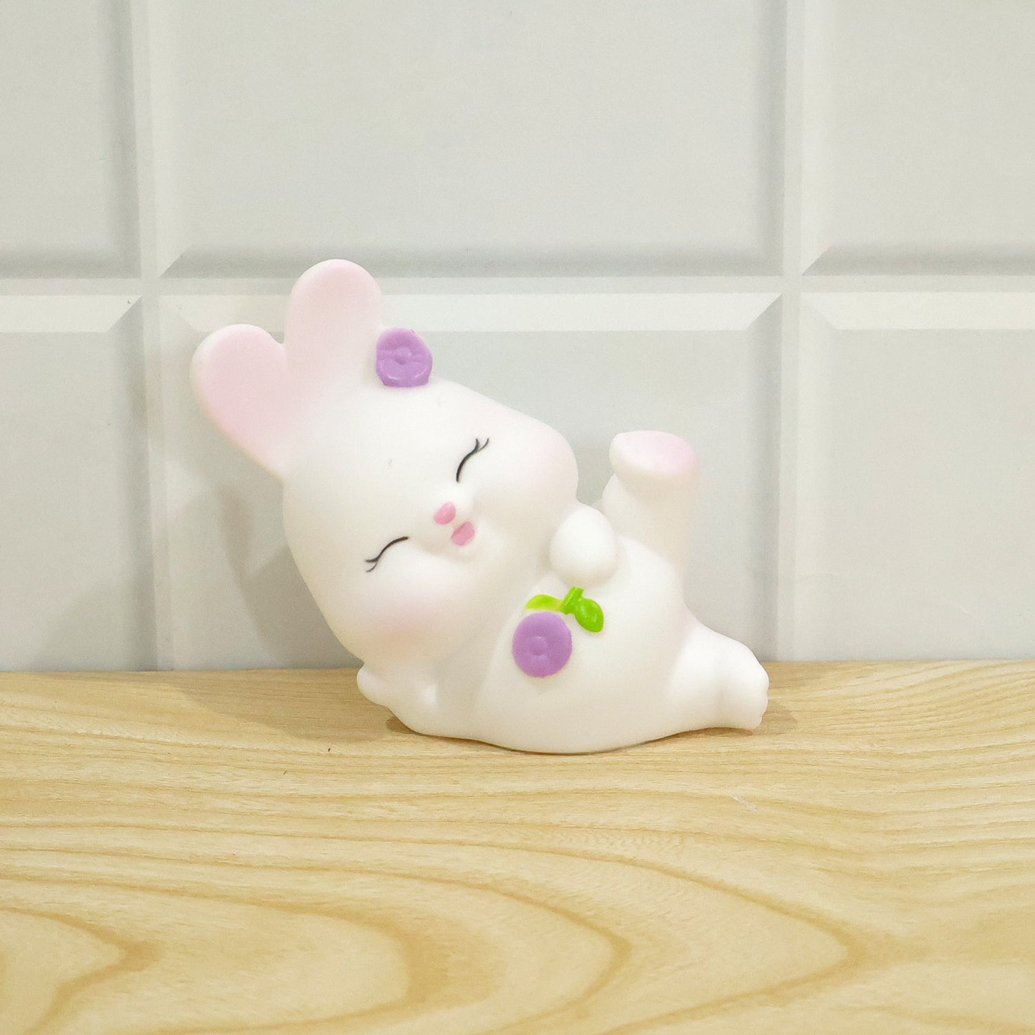 Reclining rabbit night light used as room decor