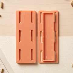 Sliding insert plate retainer clip front and back view