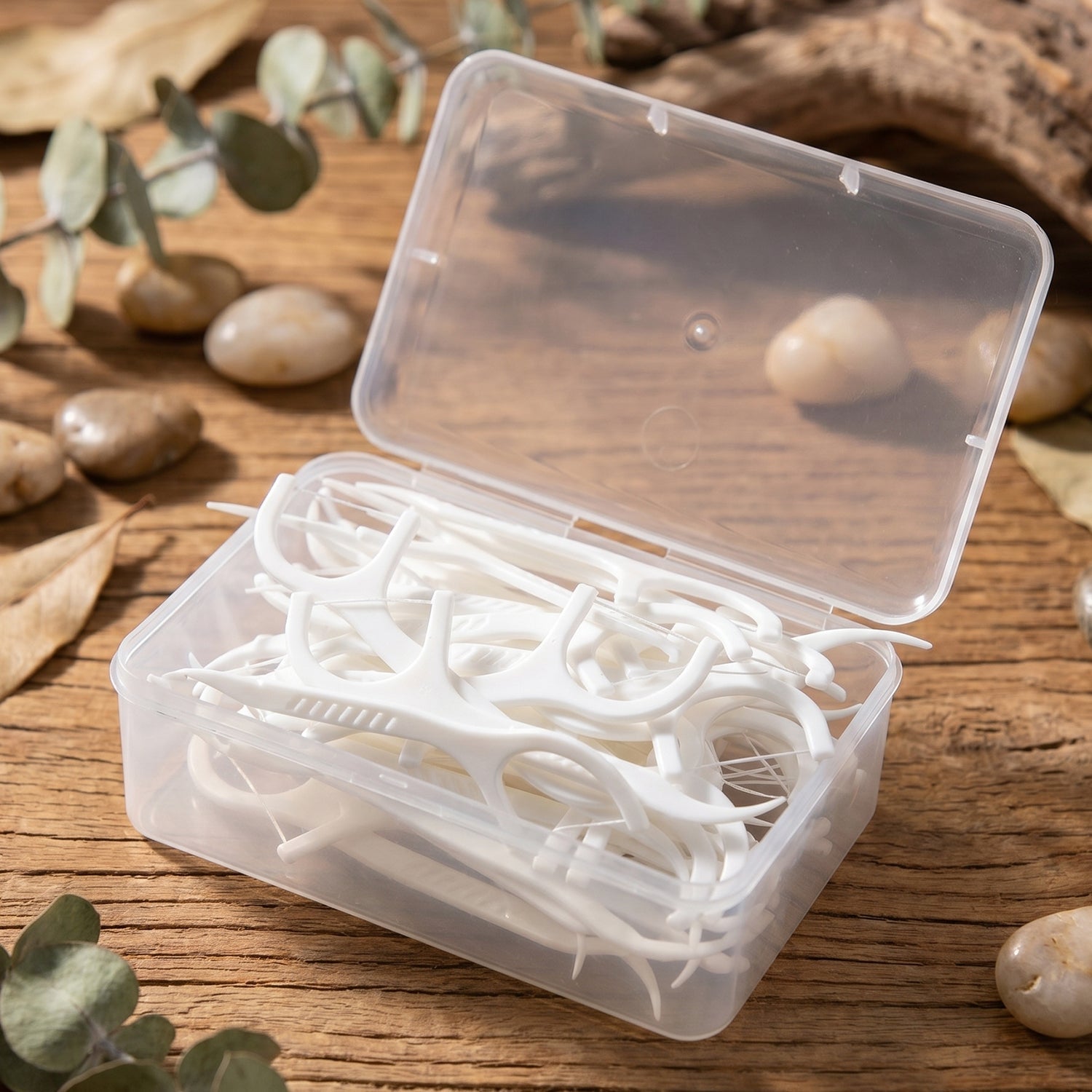 Portable case holding dental flosser sticks