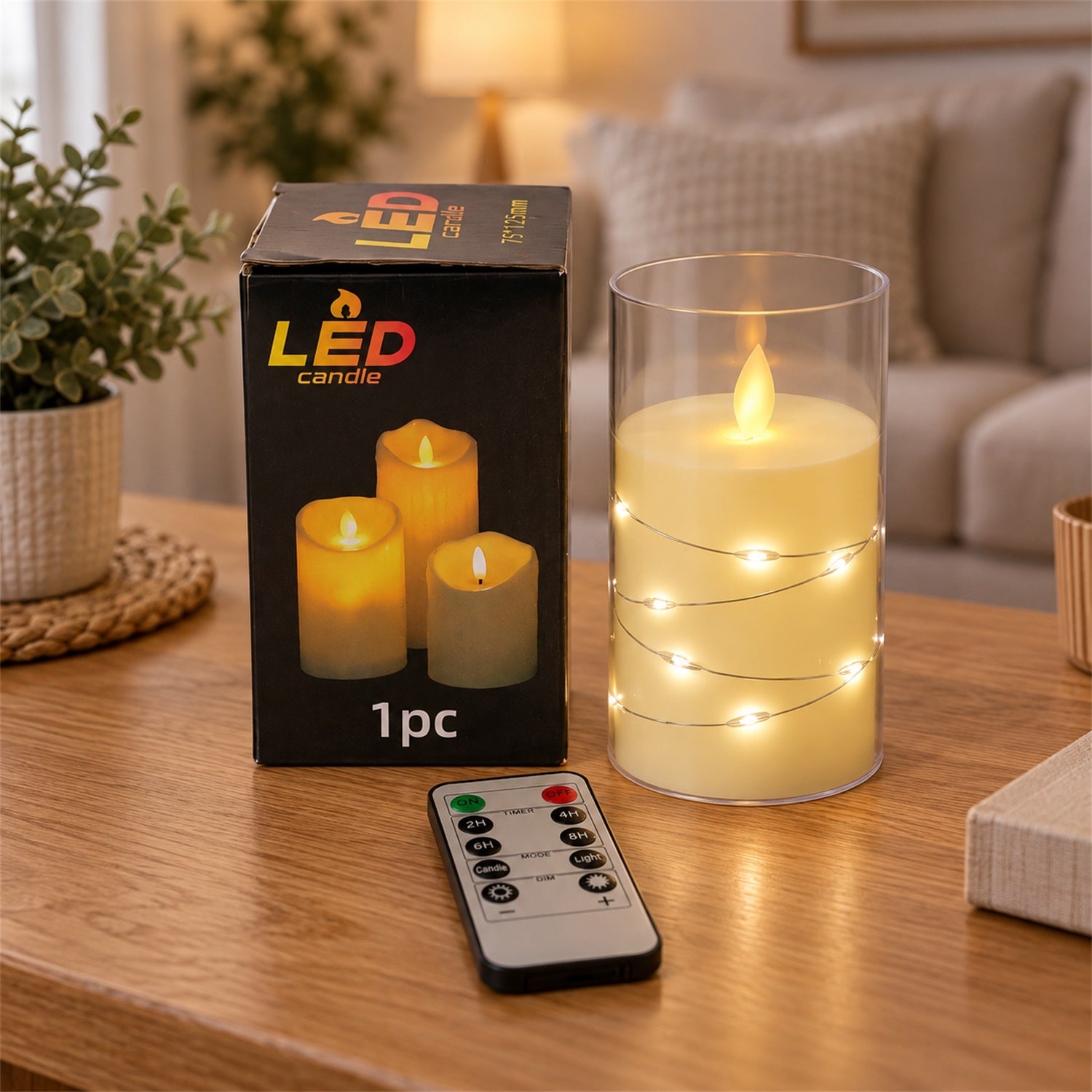 A single LED candle in a clear glass cylinder, wrapped with a string of tiny lights, next to its box and remote control on a