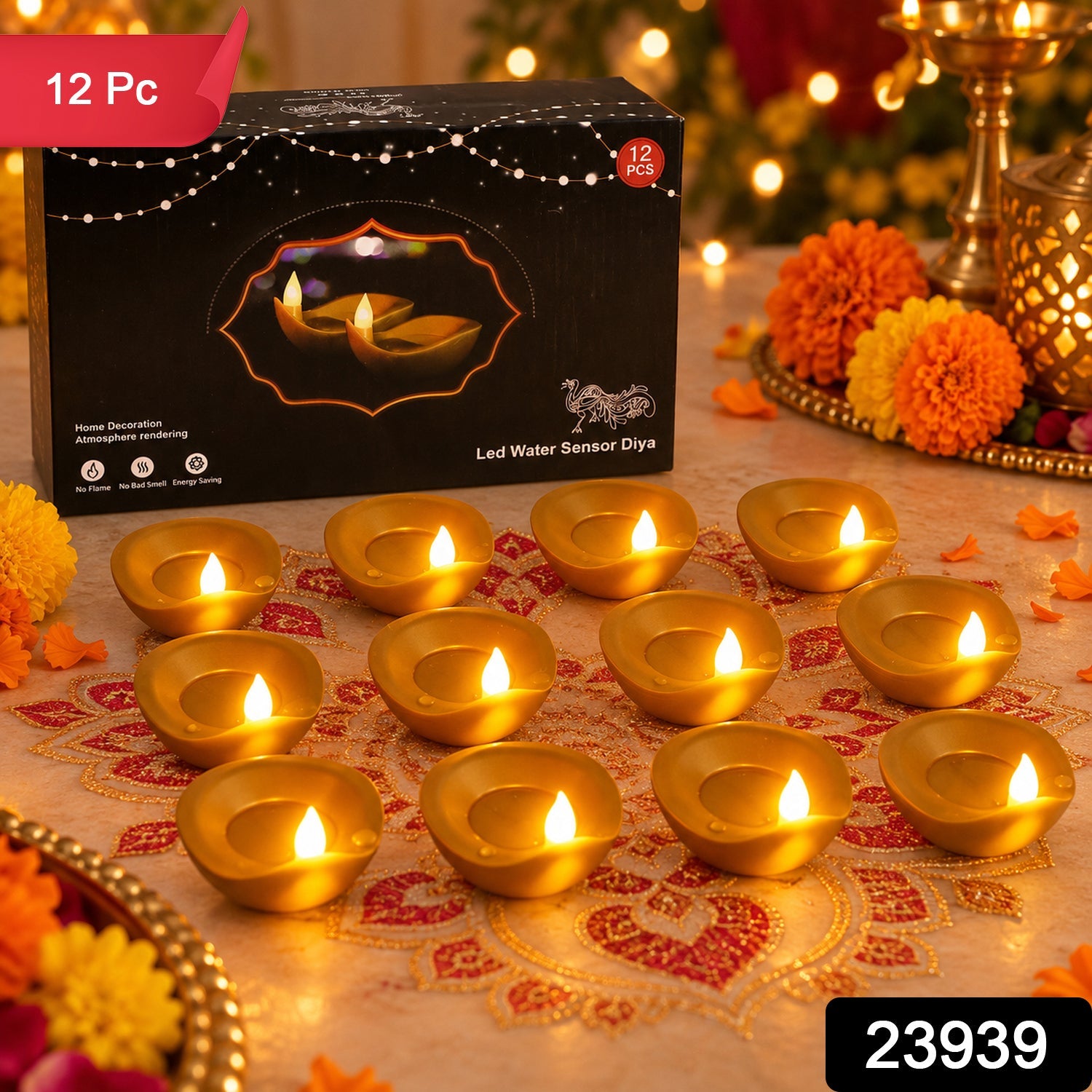 A dozen gold LED diyas with bright wicks are displayed on an embroidered fabric with a product box.