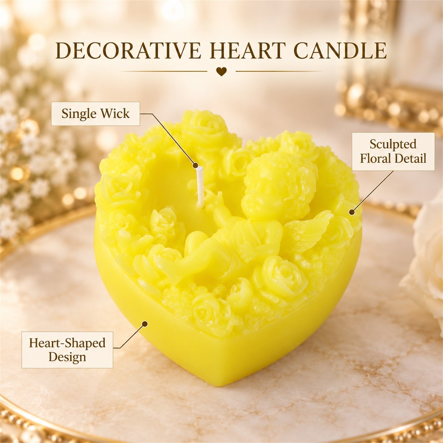 A close-up of a yellow heart-shaped candle with a single wick and sculpted floral details, on a gold tray.