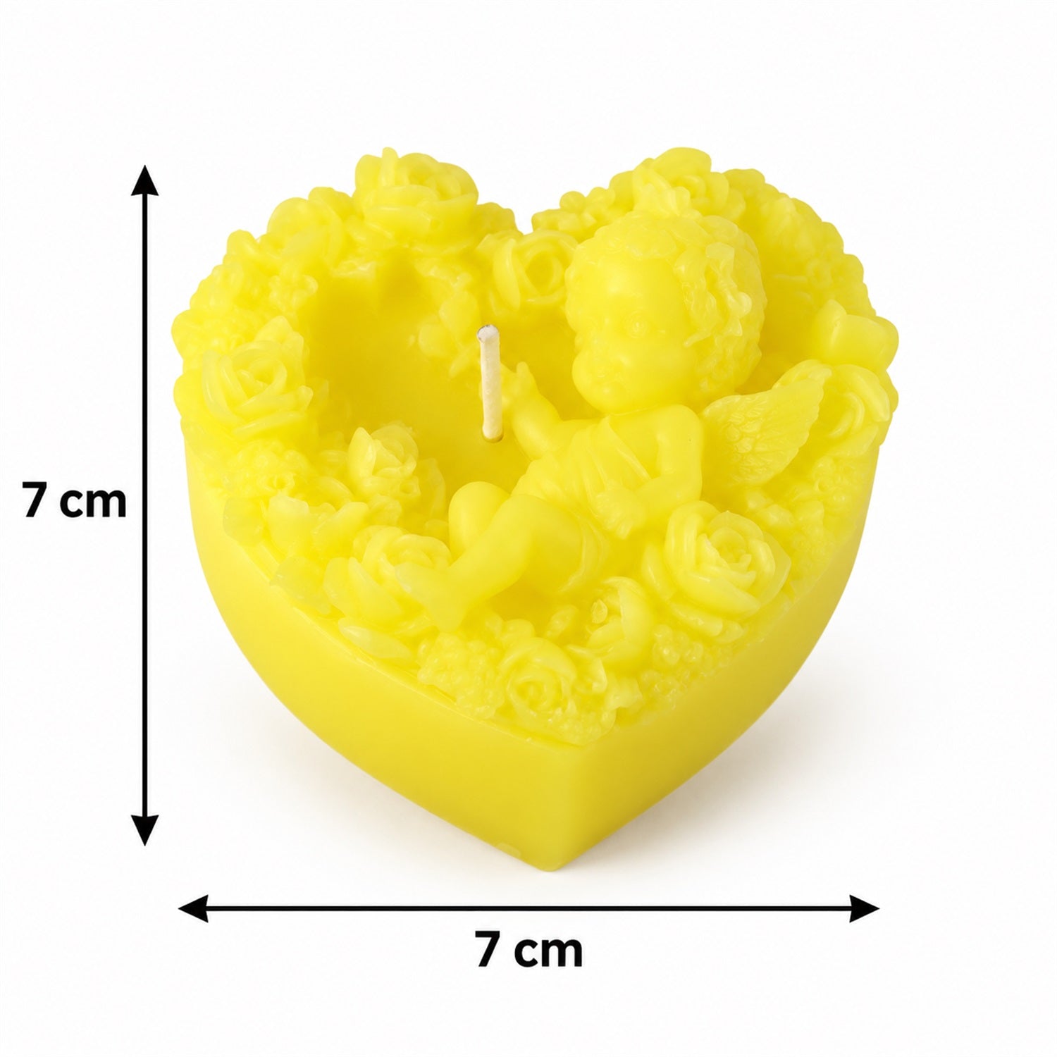 A yellow heart-shaped candle with cherub and floral designs, showing dimensions of 7 cm in width and height.