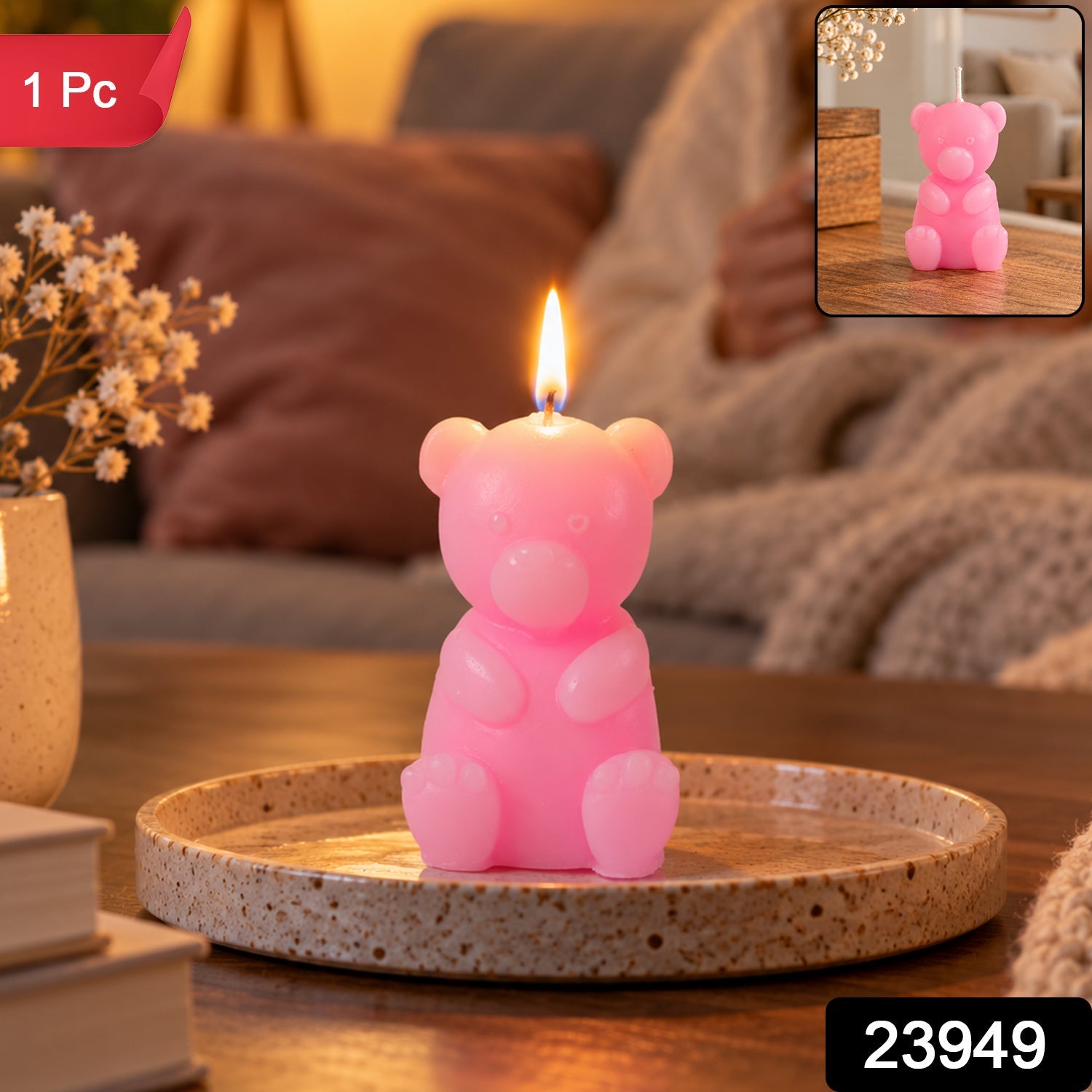 A lit pink teddy bear candle on a ceramic plate, with a small inset image of the same candle.