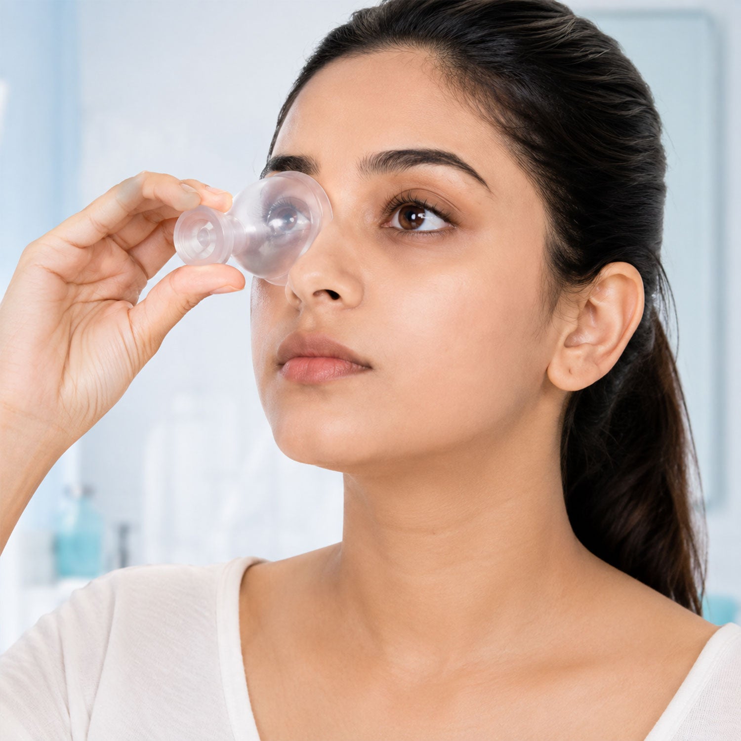 Compact transparent eye wash cup use