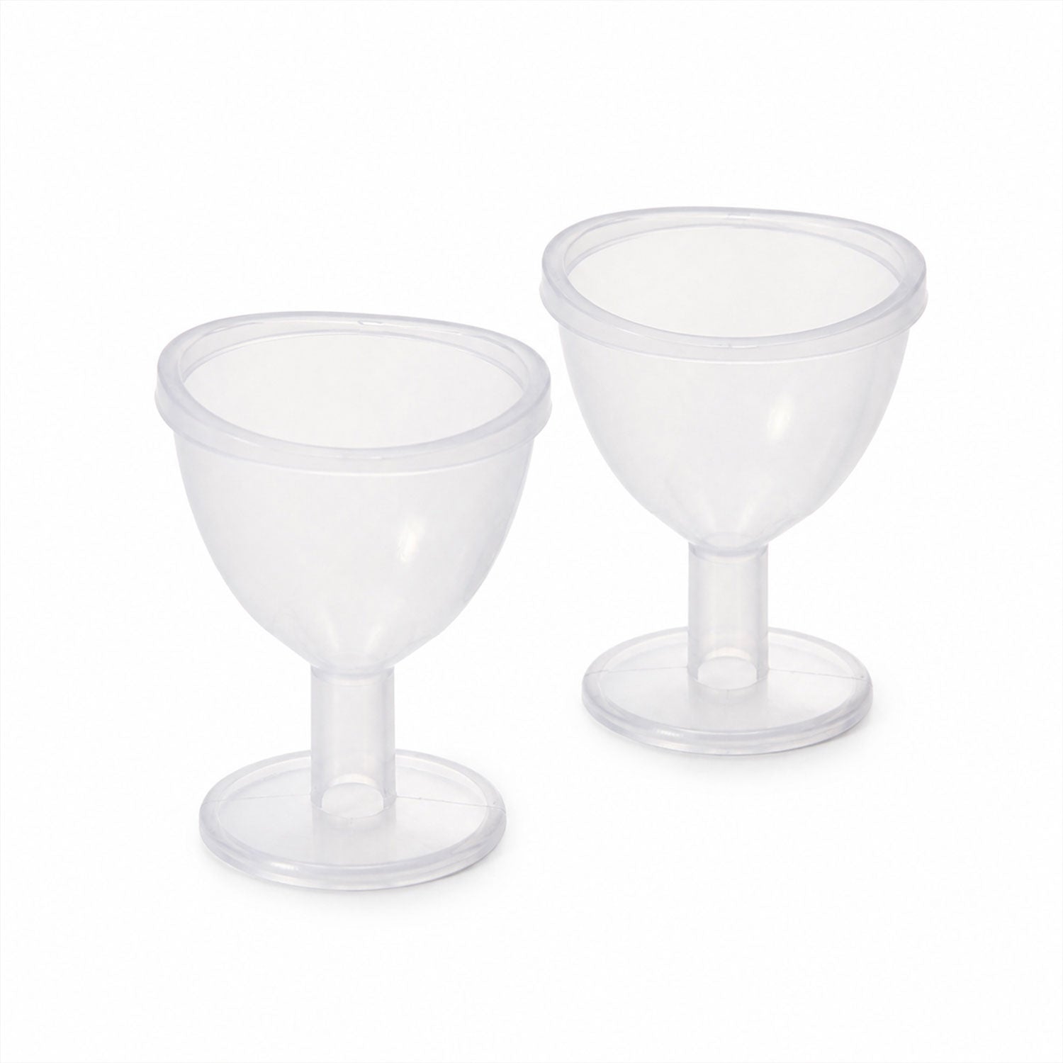 Transparent eye wash cup set on white background
