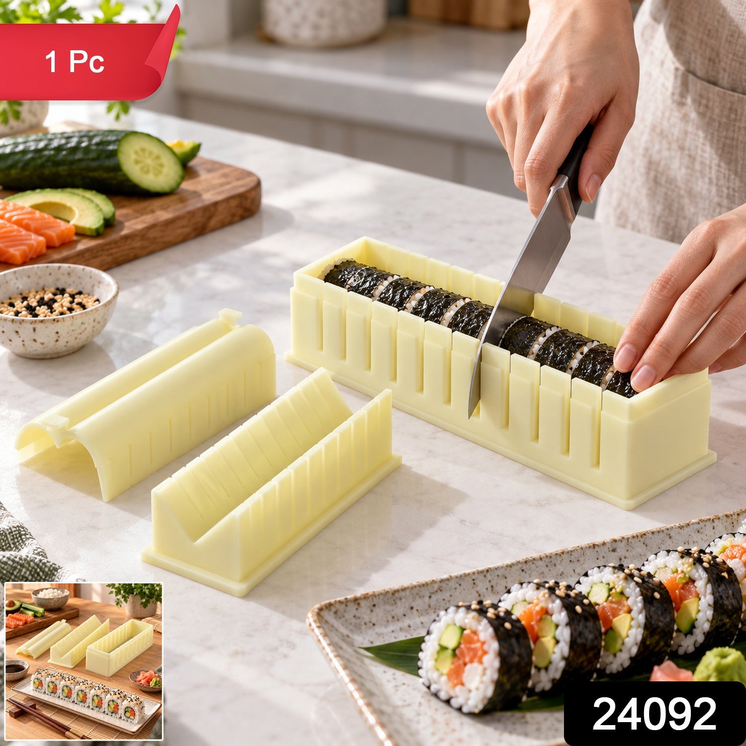 A person slices sushi rolls in a light yellow plastic mold, with finished rolls on a plate nearby.