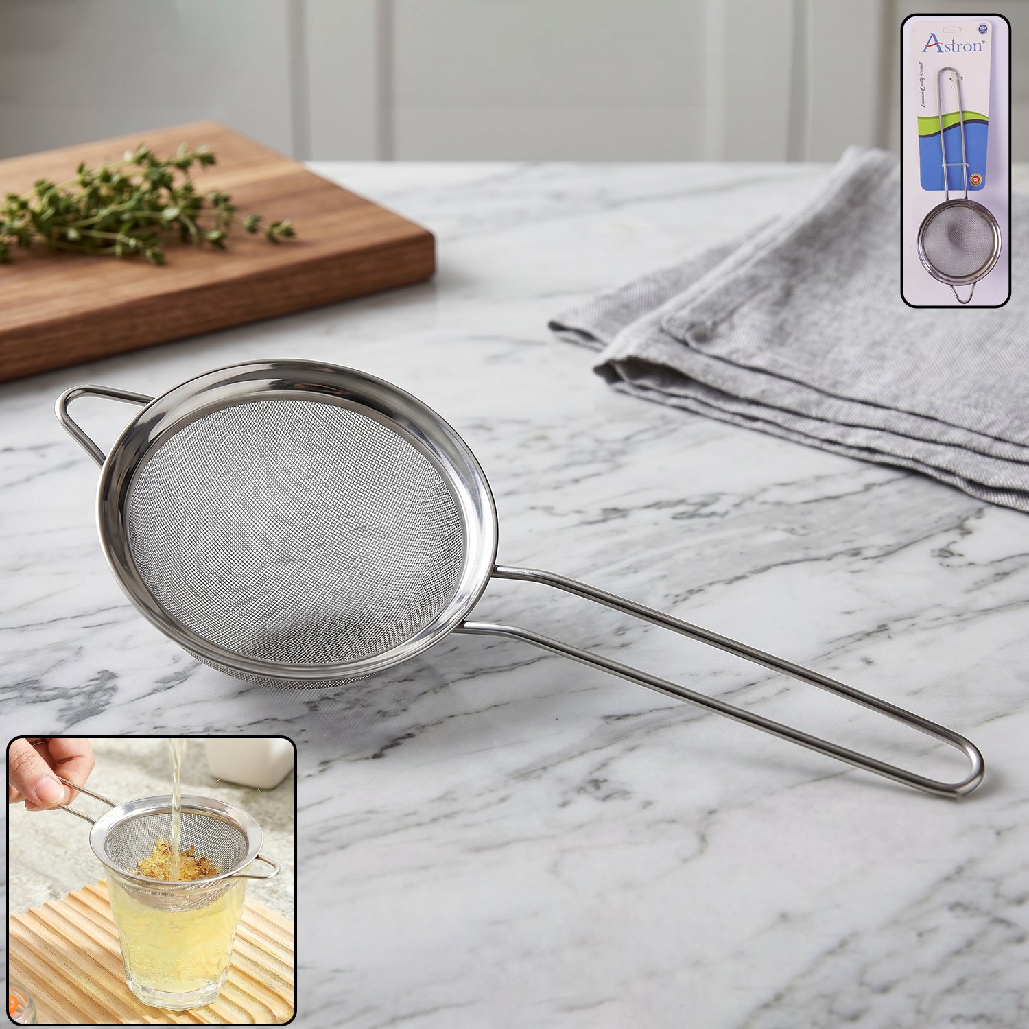 Close-up of steel tea strainer with ergonomic long handle