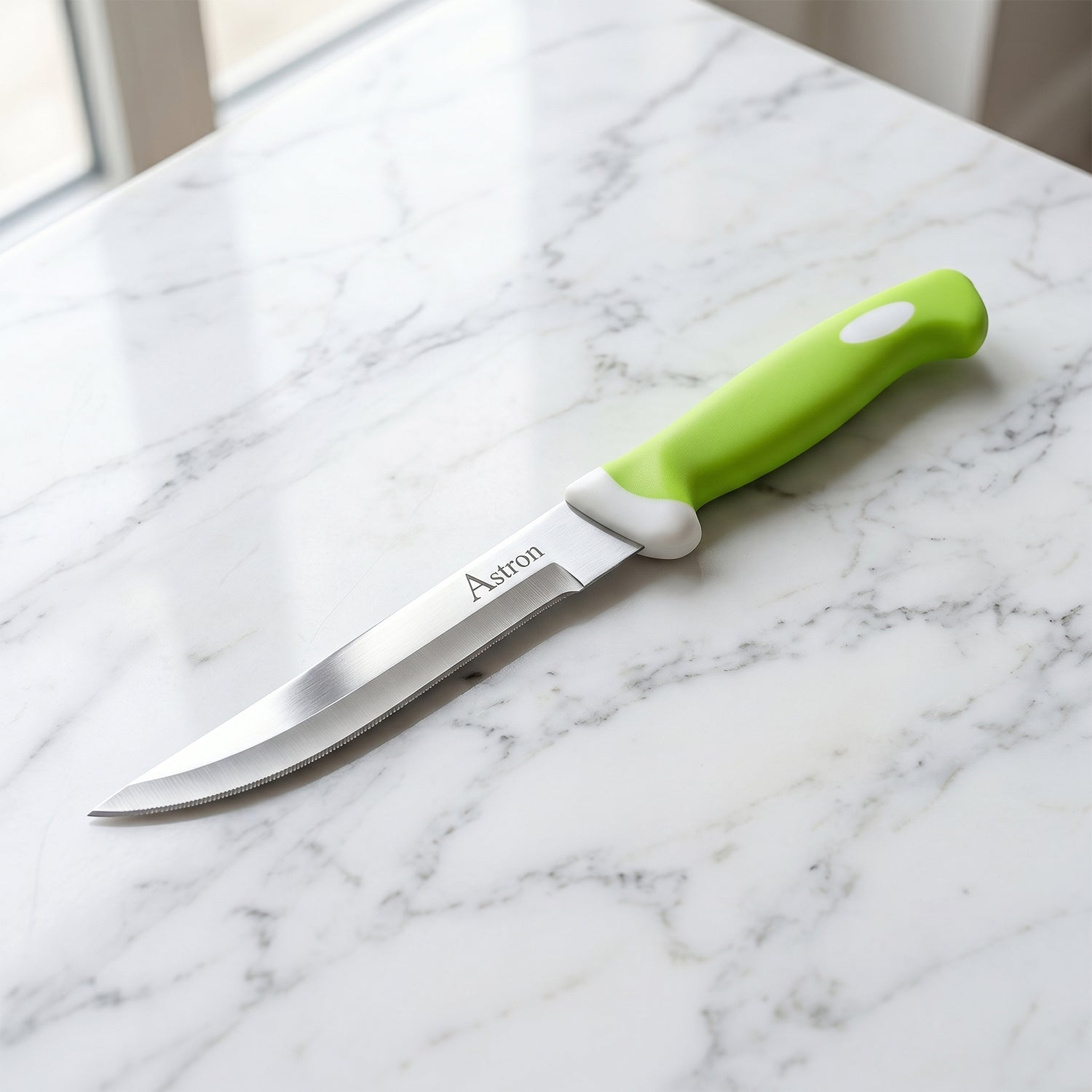 Close-up of 9-inch stainless steel knife with ergonomic plastic handle