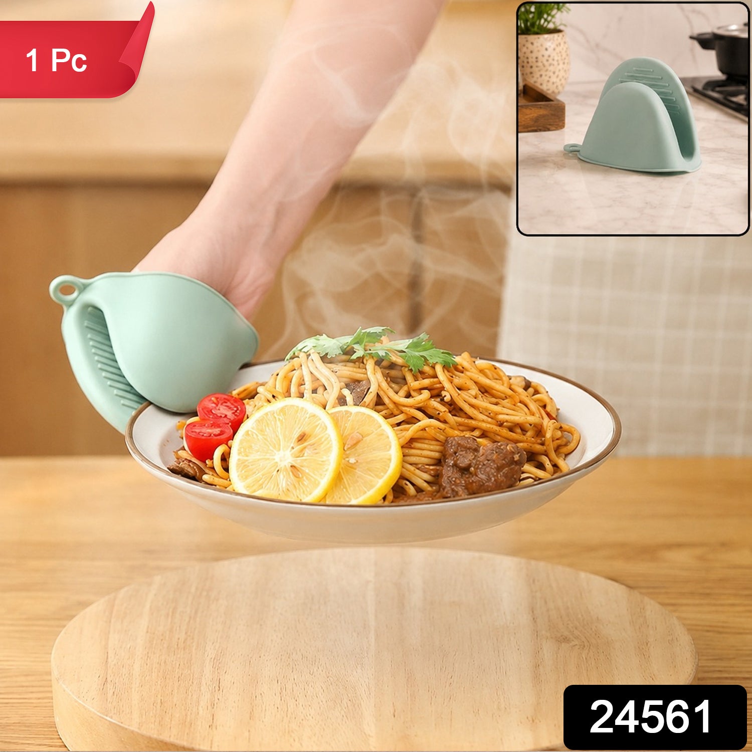 A hand wearing a green silicone mini oven mitt holds a steaming plate of spaghetti with lemon slices.