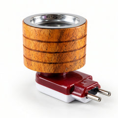 A light brown wooden electric camphor diffuser with a silver metal cup sits on a plain white background.