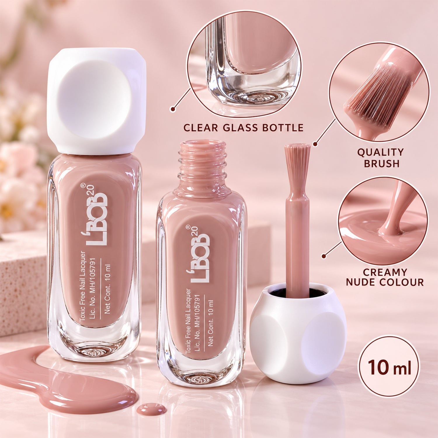 Two bottles of nude pink nail polish with an open bottle showing the brush and spilled polish on the surface.
