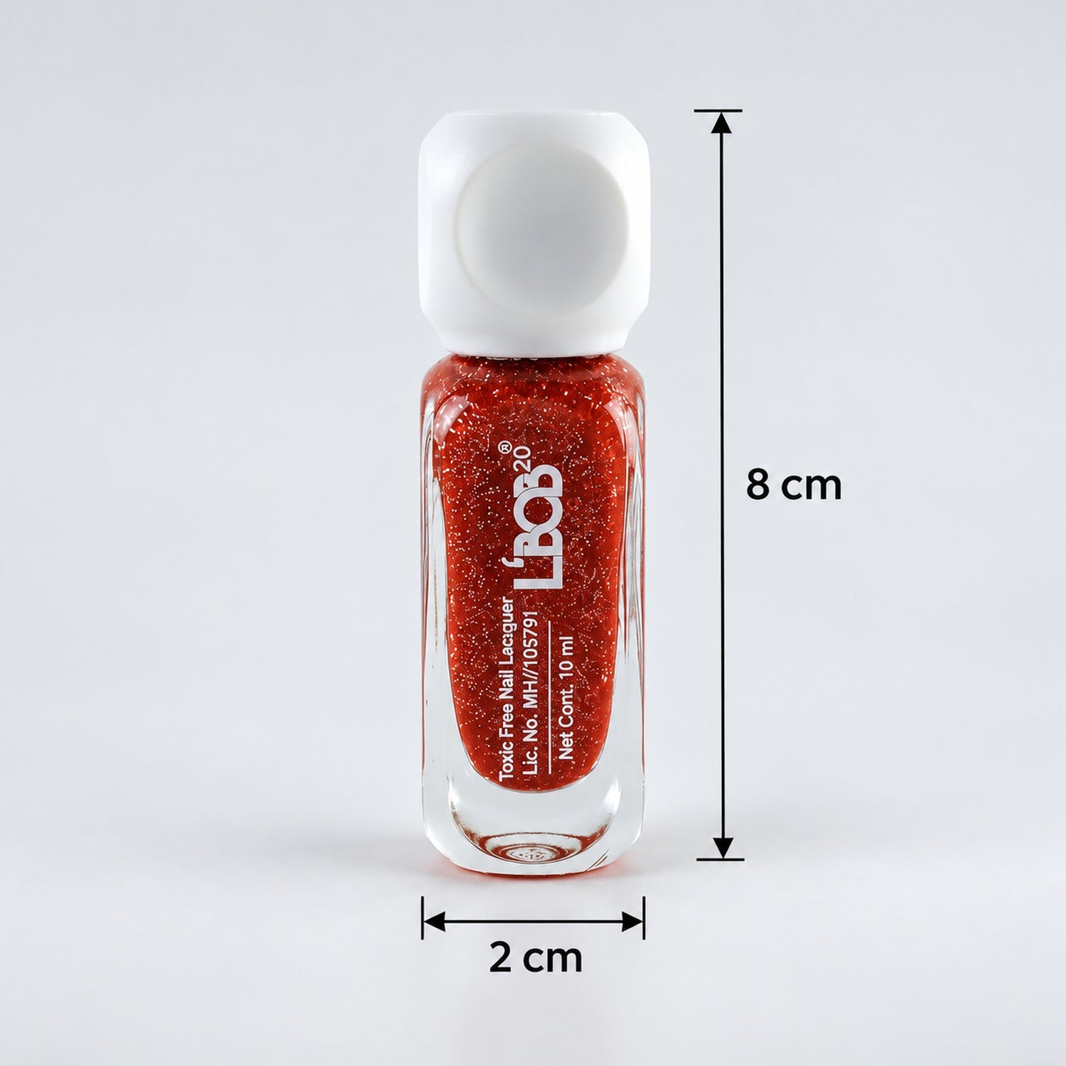 A small, clear glass bottle of red glitter nail polish with a white cap, showing 8 cm height and 2 cm width.