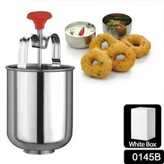 Medu vada maker in use over hot oil
