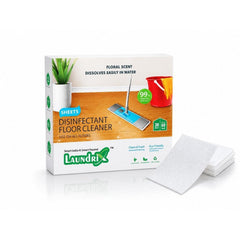 A white box of disinfectant floor cleaner sheets with a stack of white cleaning sheets beside it on a white surface.