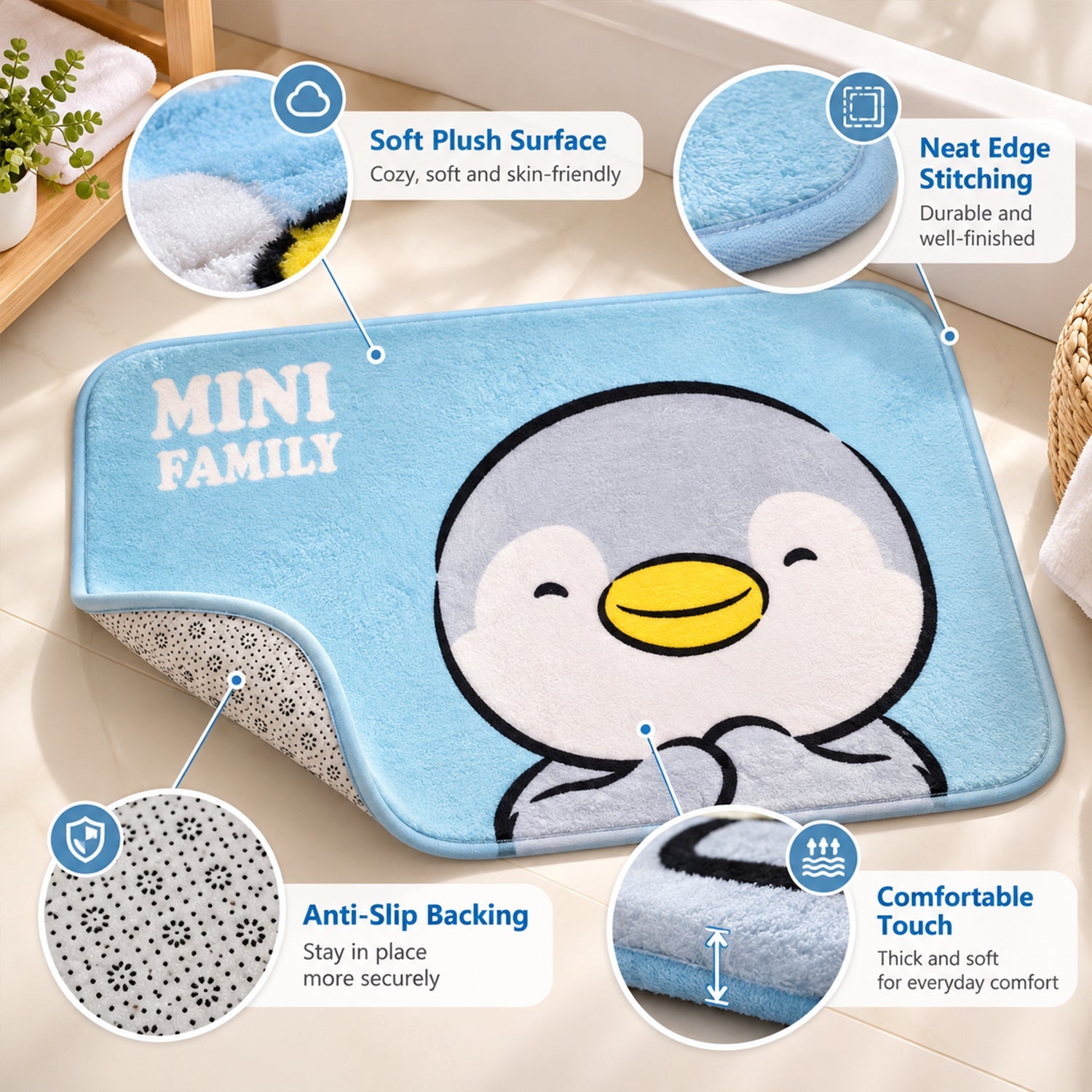 A blue bath mat with a penguin design highlights its soft plush surface, neat edge stitching, and anti-slip backing.