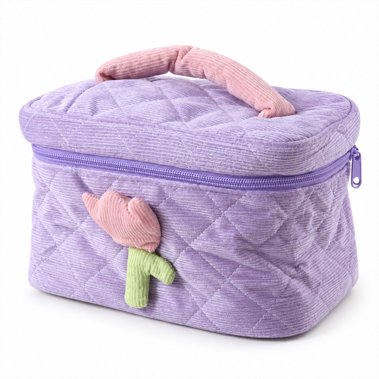 A closed lavender quilted corduroy cosmetic bag with a pink and green tulip applique and a pink handle, presented on a white