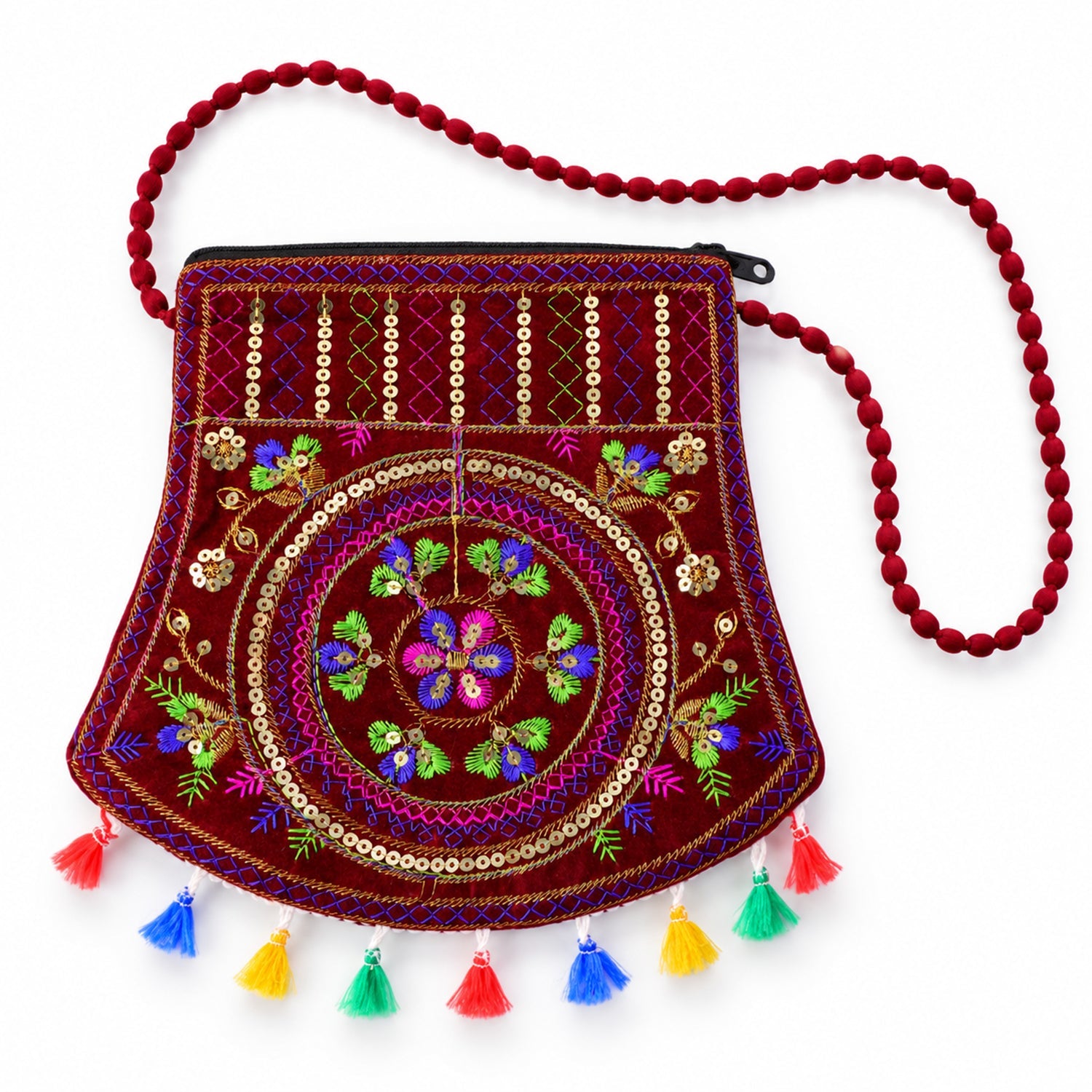 A maroon velvet sling bag with a beaded strap, colorful embroidery, sequins, and bright tassels on a white background.