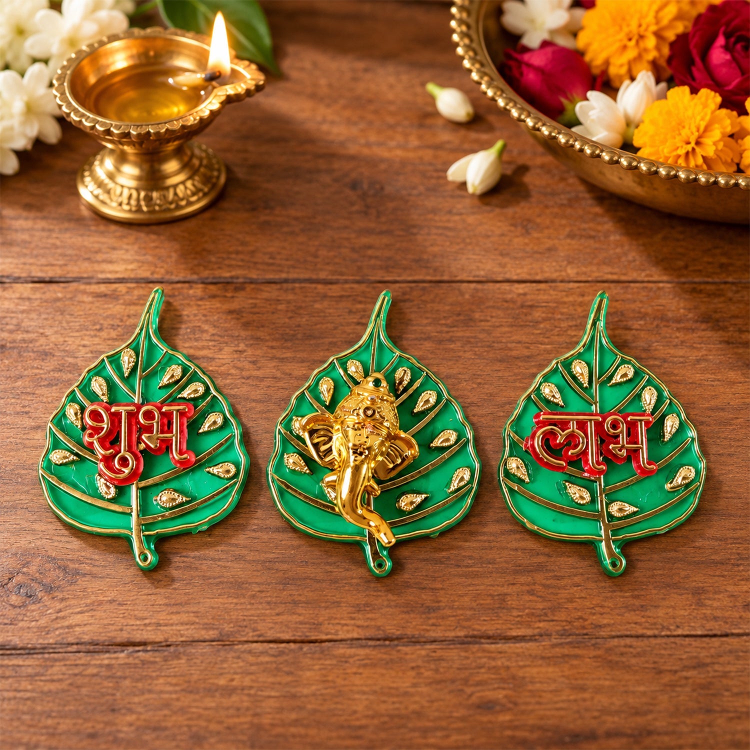 Close up of Shubh Labh Ganesh leaf design with gold detailing
