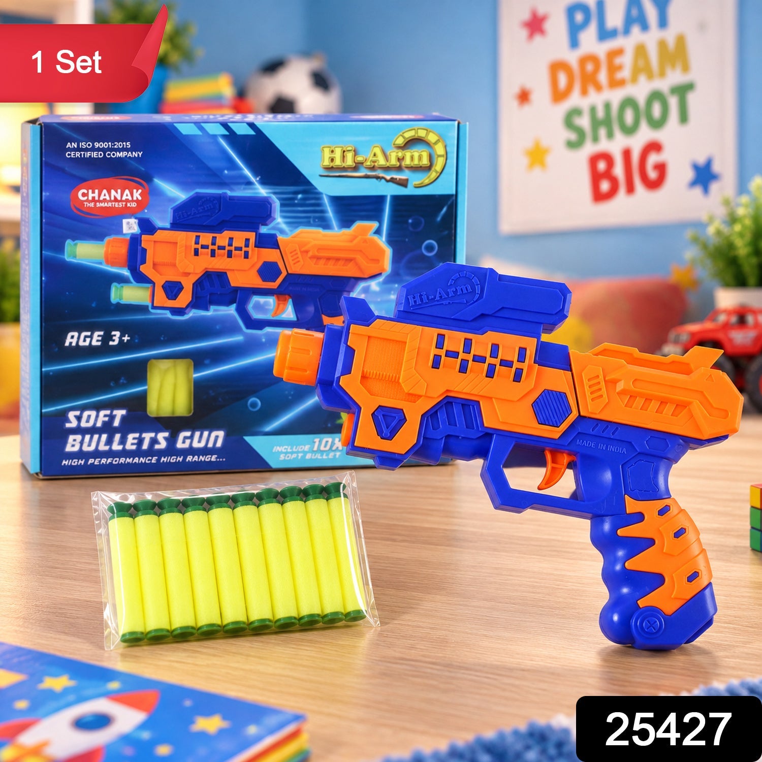 An orange and blue toy gun with a box of soft bullets on a wooden table, next to its packaging. A red banner with '1 Set' is