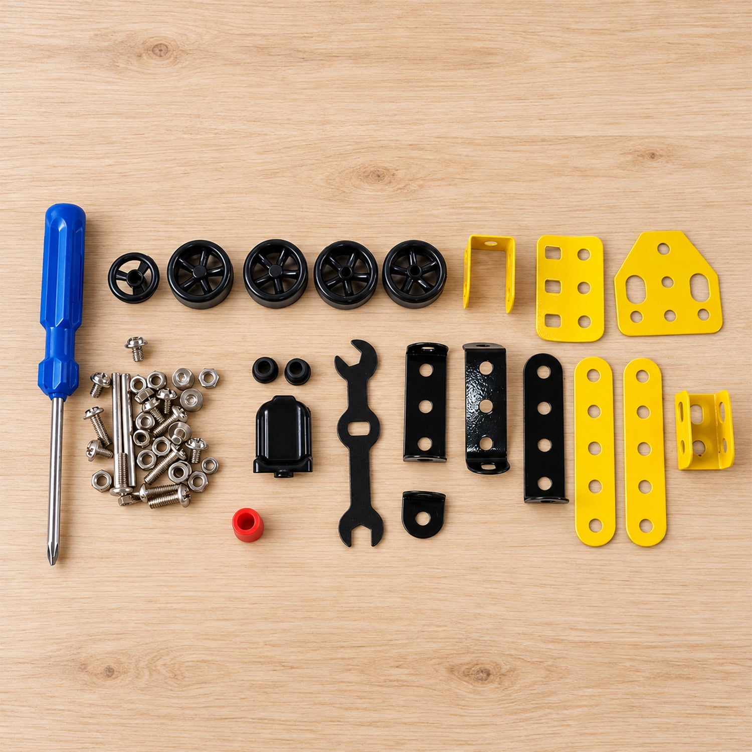 Complete DIY vehicle construction kit with all components on a white background