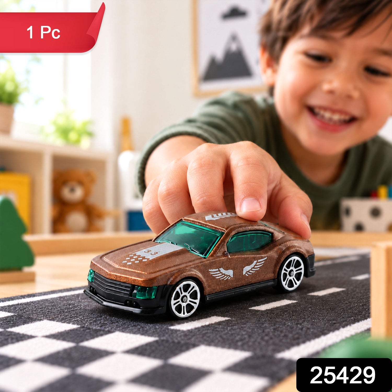 A young child's hand gently places a metallic brown toy car on a playmat with a road design.